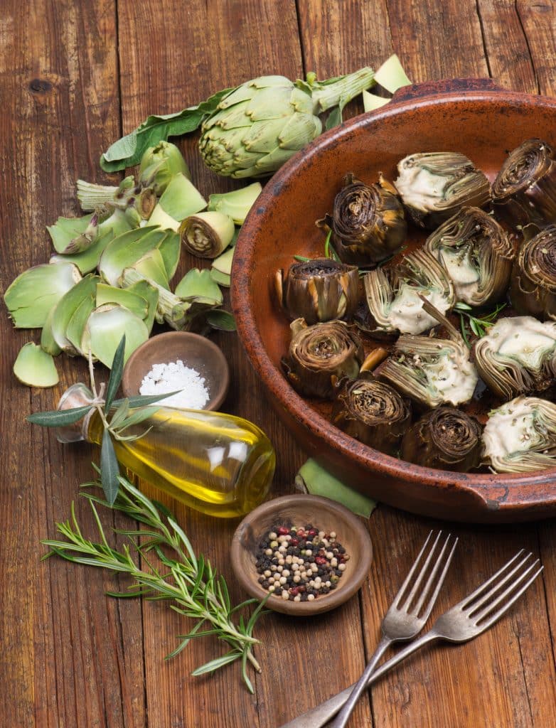 Whole fresh artichokes with tight green leaves
