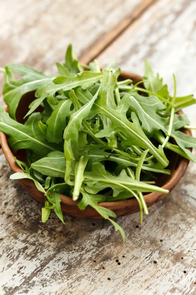 Fresh arugula leaves in a pile