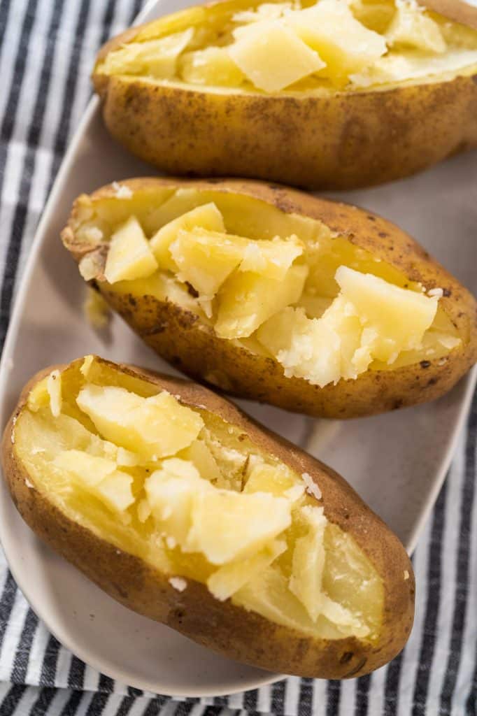 Baked potatoes with an assortment of toppings