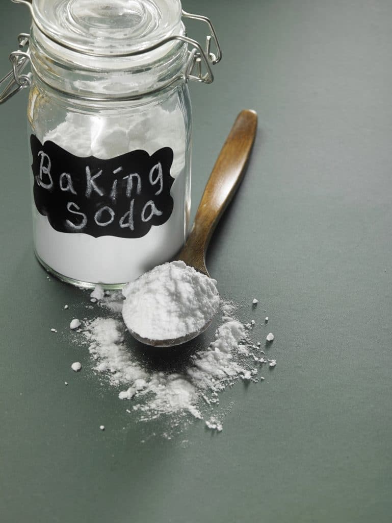 Box of baking soda on a kitchen shelf
