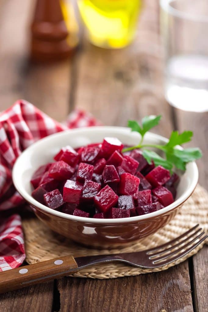 Whole red beets with stems