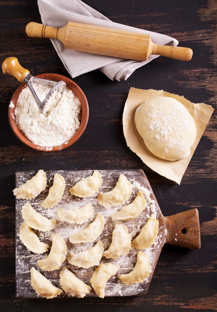 Raw dumplings on a plate