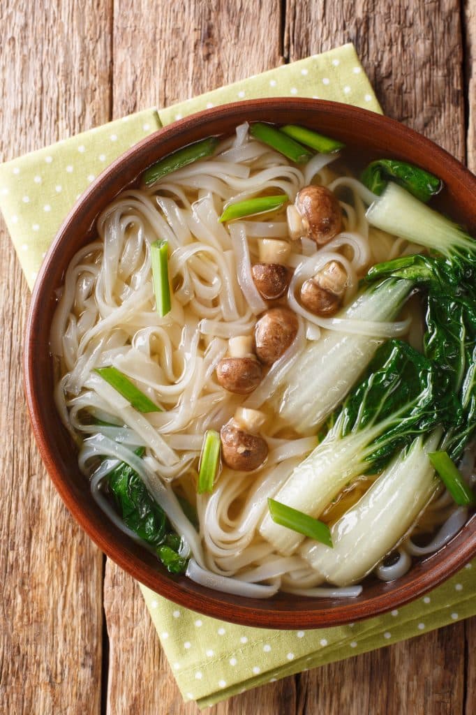 Bok choy heads with pale stems and green leaves