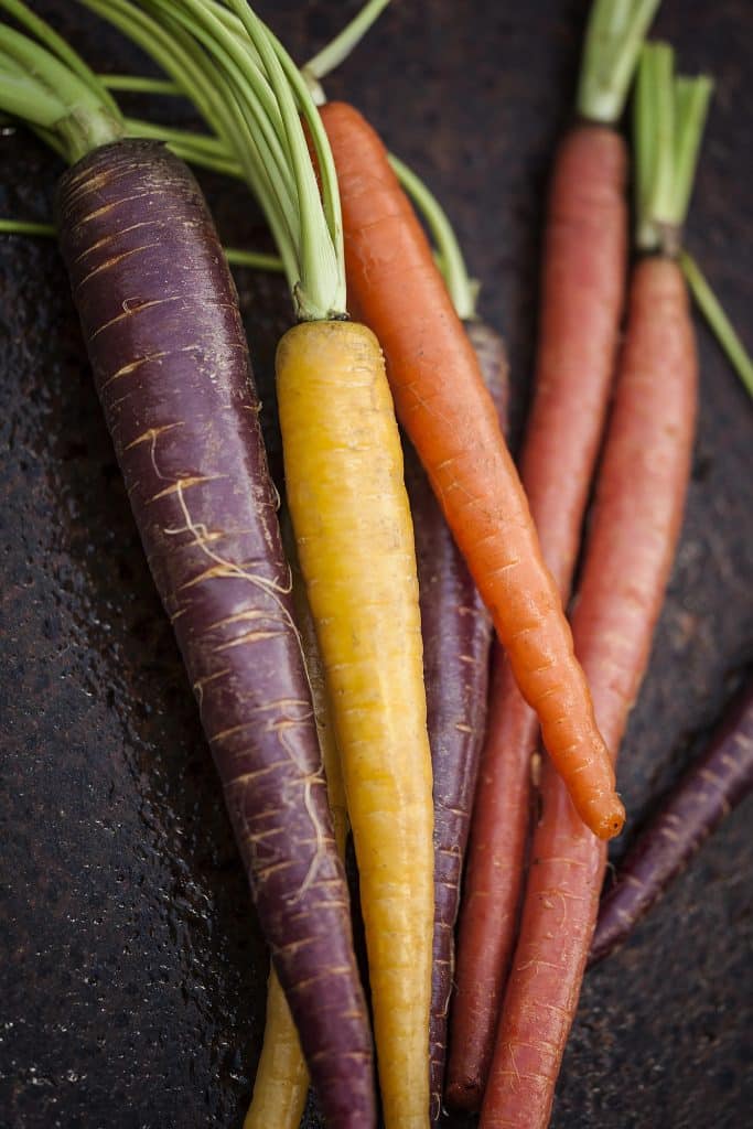 Whole carrots grouped together