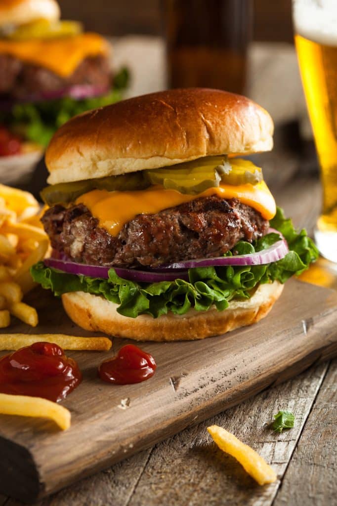 Cheeseburger with melted cheese on a toasted bun