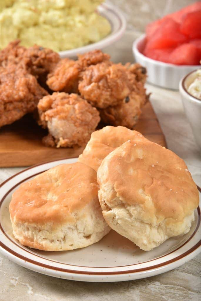 Chicken in gravy topped with biscuits