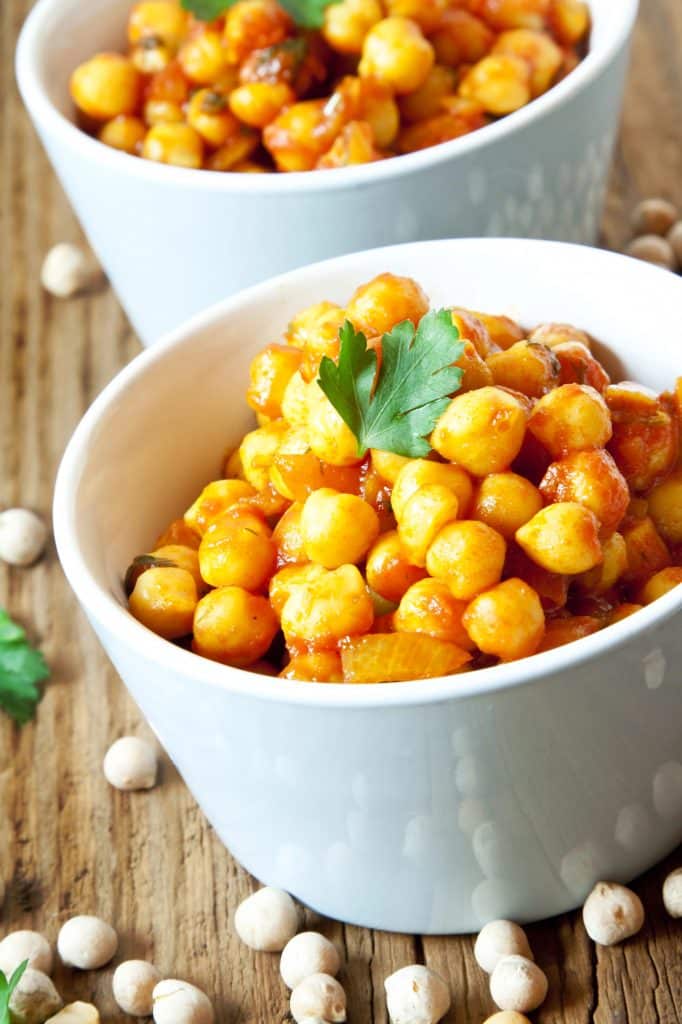 A close-up bowl of dried chickpeas