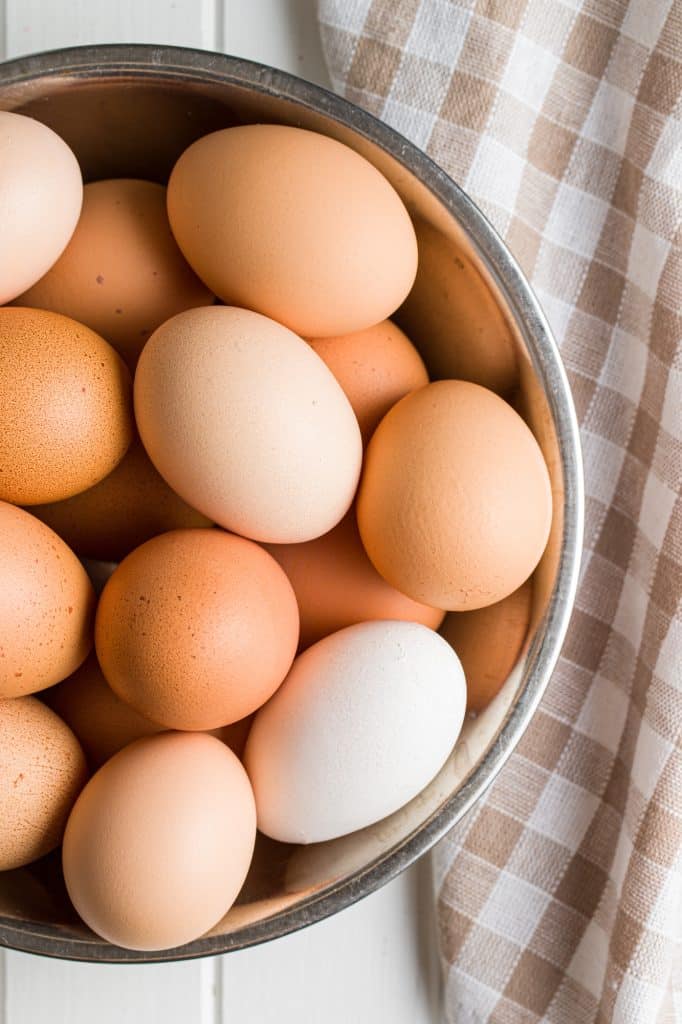 A cluster of fresh whole eggs