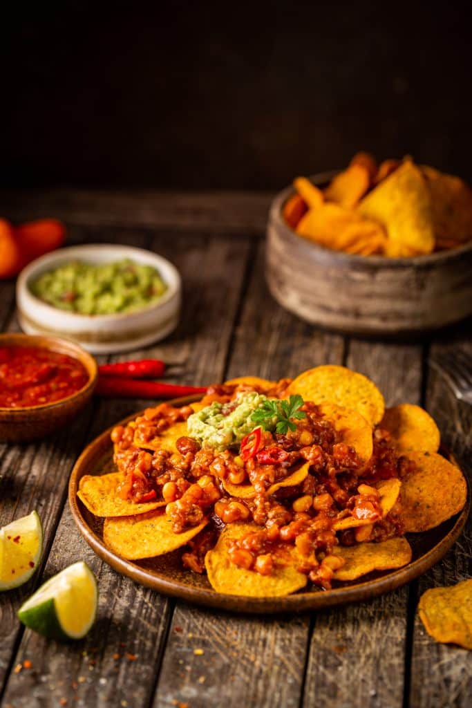 Chili and cheese served over corn chips