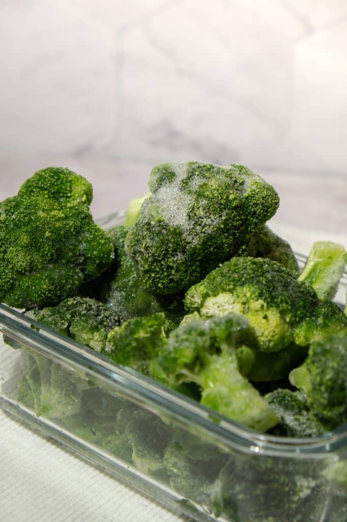 Frozen broccoli florets in a bowl