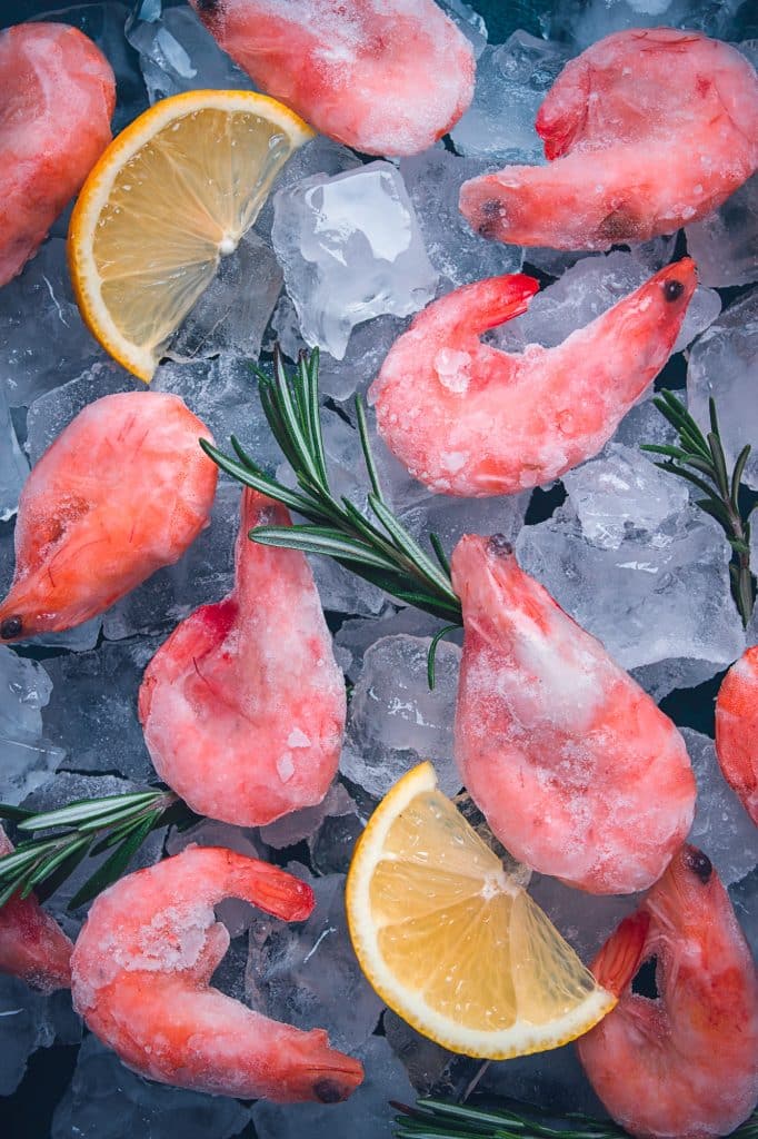 Frozen shrimp on a plate ready to cook