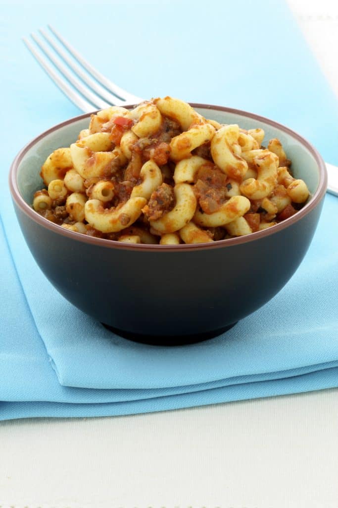 A skillet of cheesy ground beef pasta