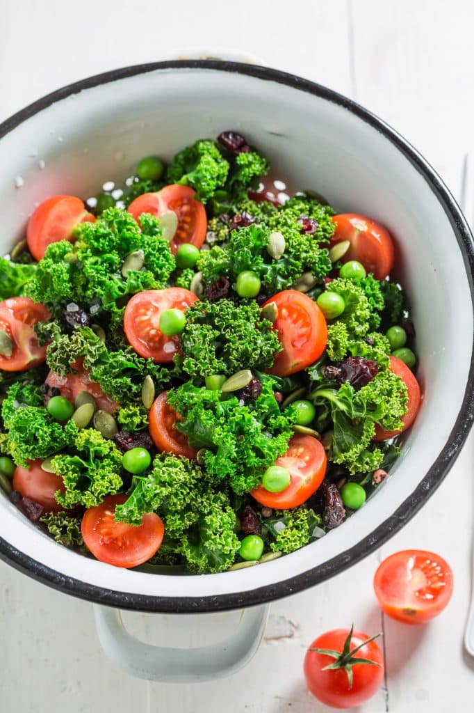 Curly kale leaves on a countertop