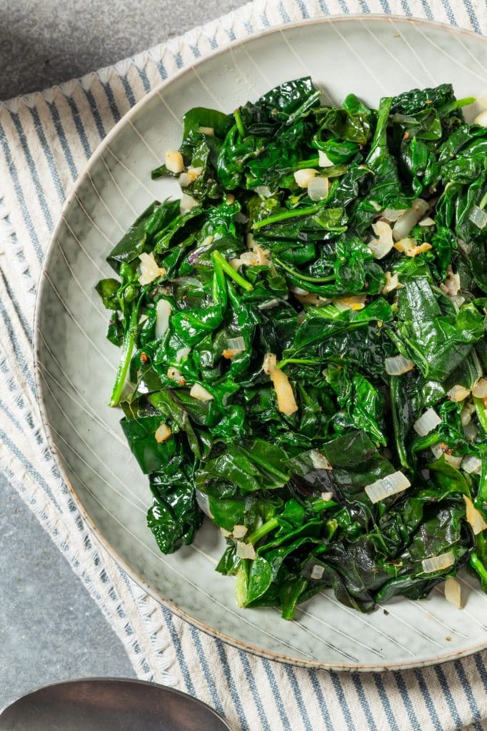 Fresh kale leaves on a countertop