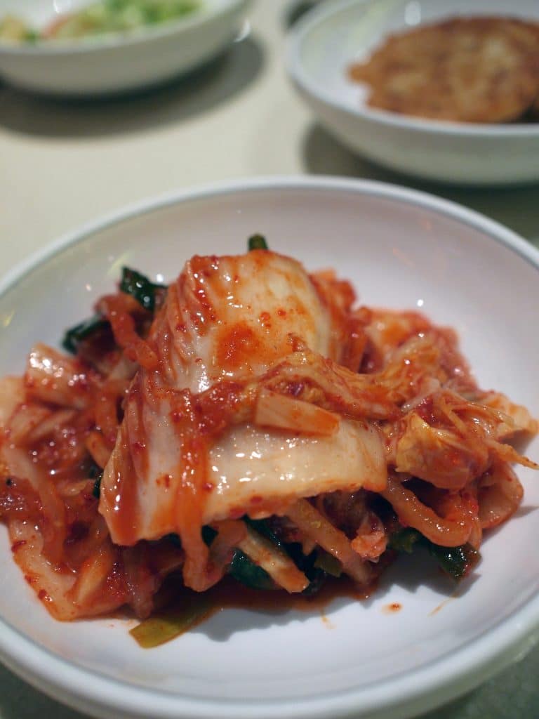 Spicy fermented kimchi in a serving dish