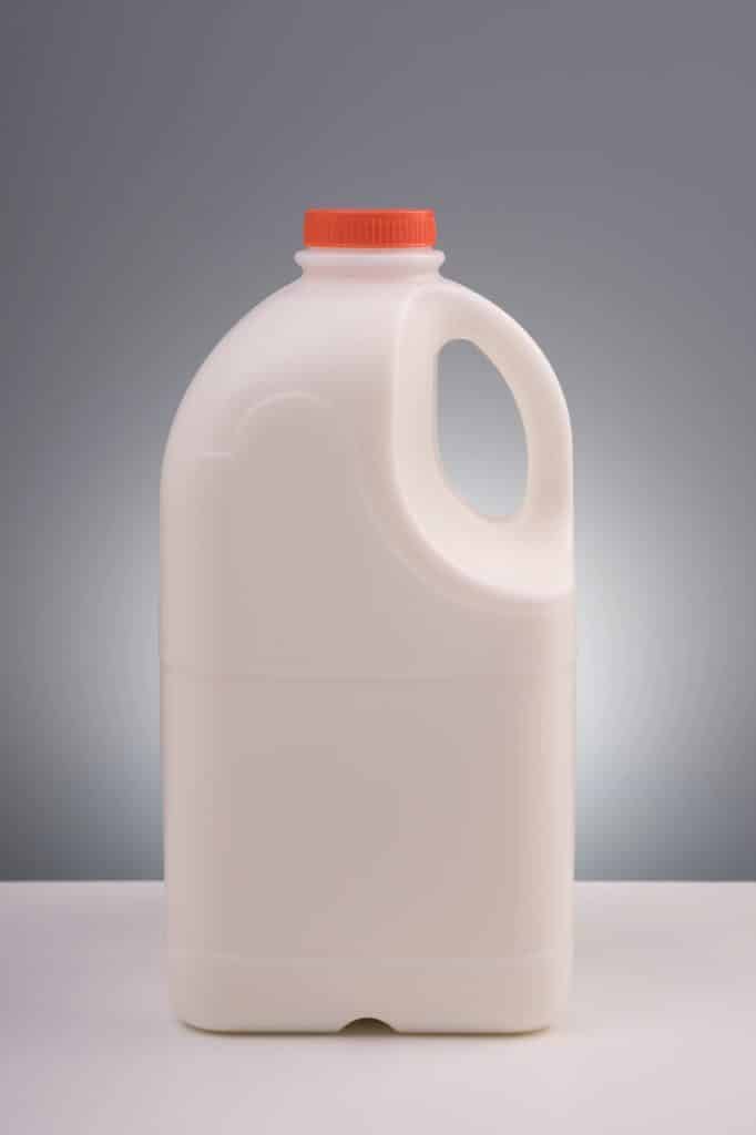 gallon of milk in a plastic jug on a counter