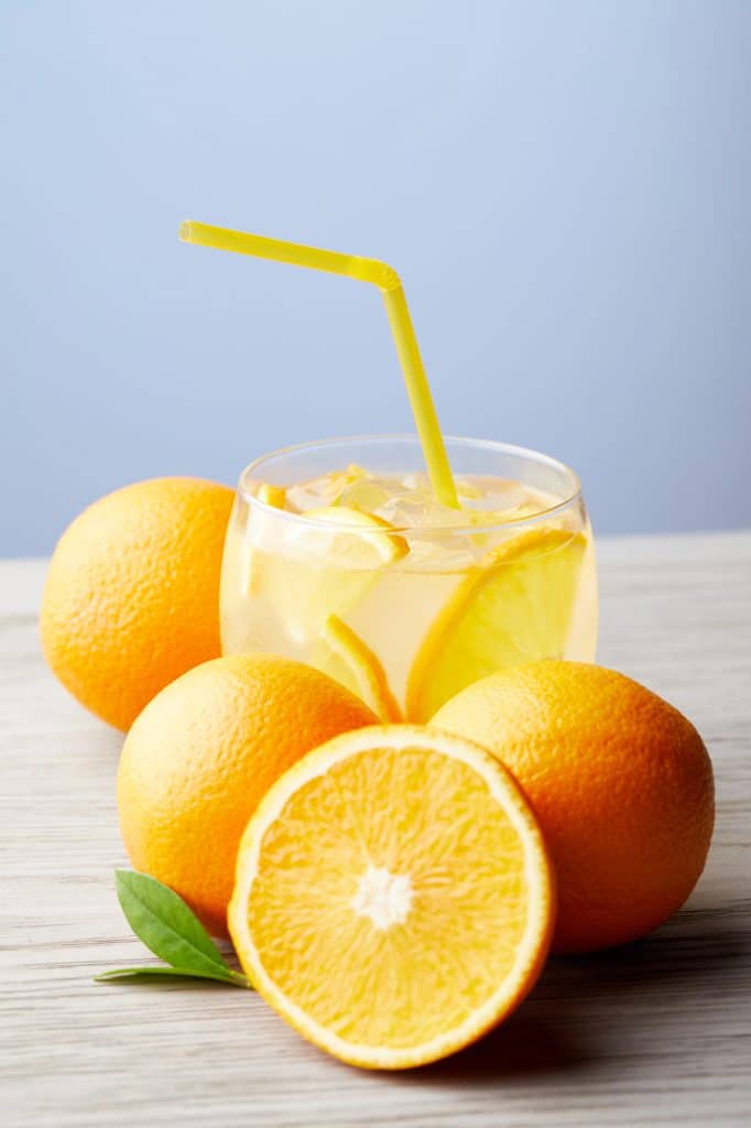 Fresh oranges stacked in a pile