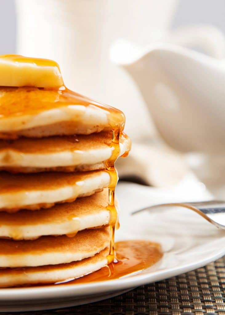 A stack of pancakes with syrup