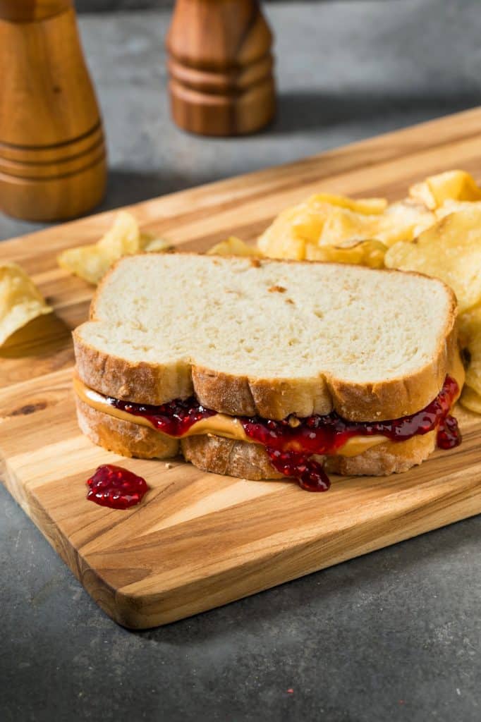 Peanut butter and jelly sandwich cut in halves