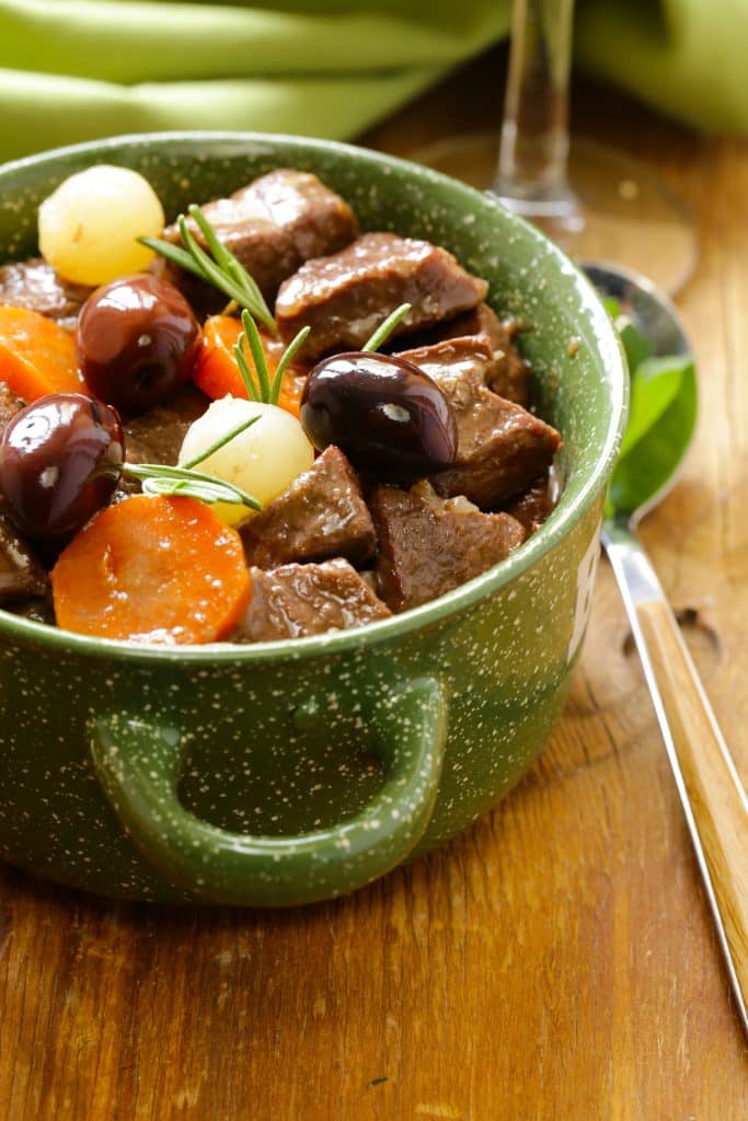 A pot roast with carrots and potatoes