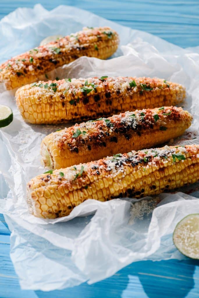 Fresh corn on the cob with husks pulled back