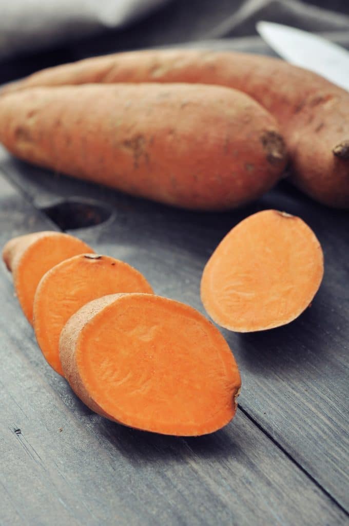 Whole raw sweet potatoes